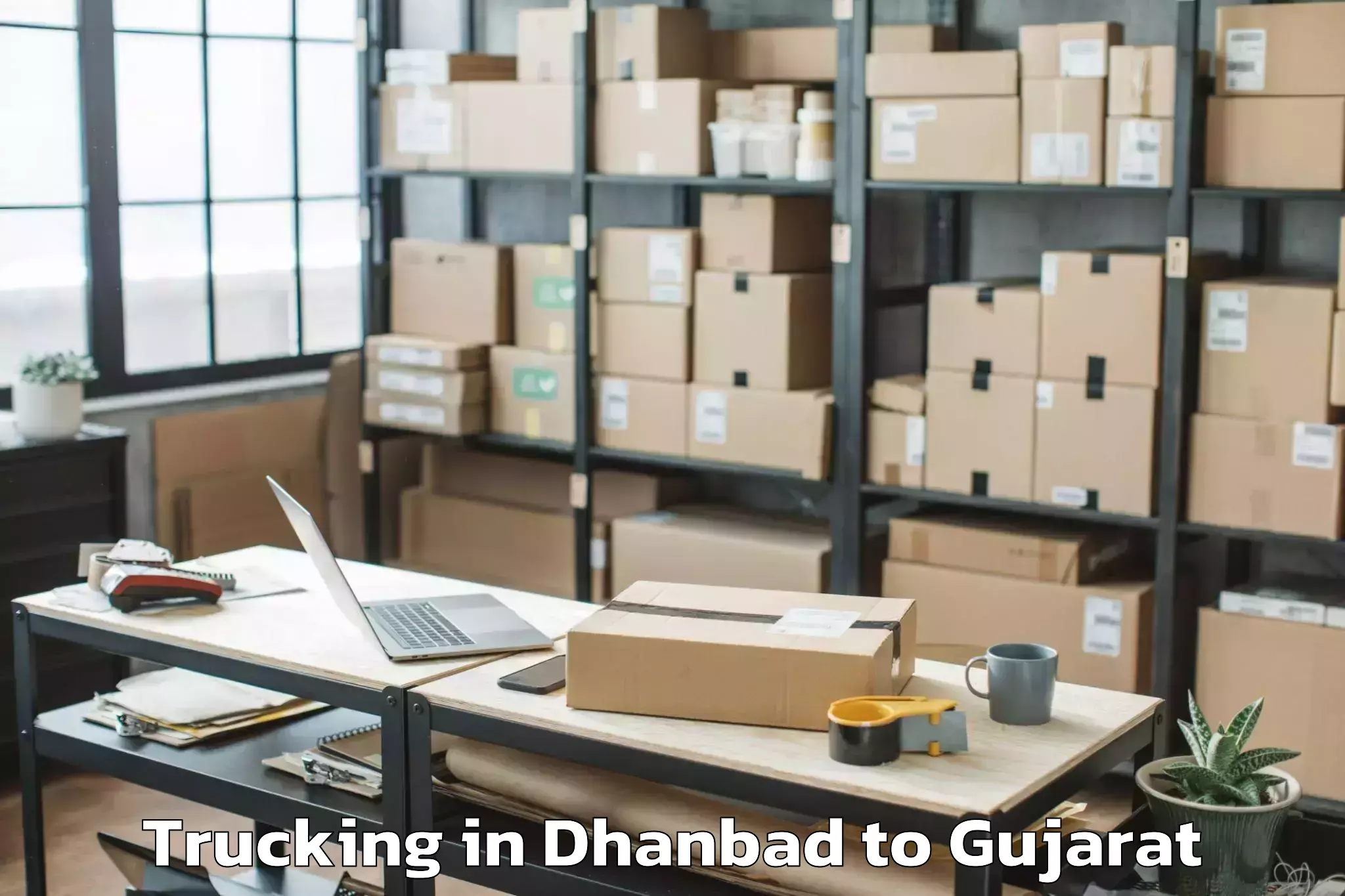 Quality Dhanbad to Lunavada Trucking